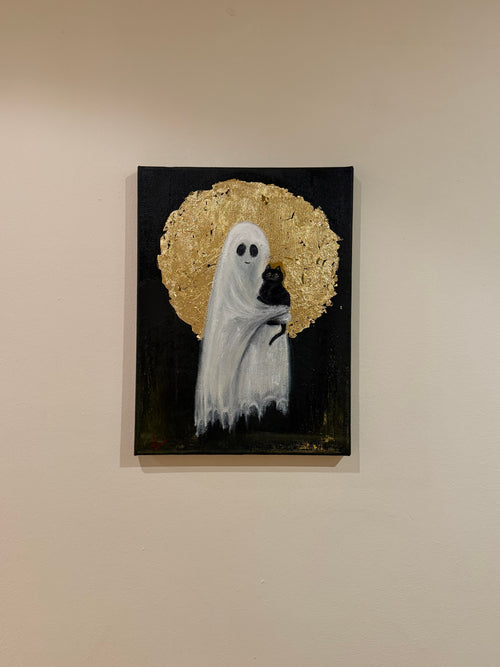 Cat in the Arms of a Sacred Ghost