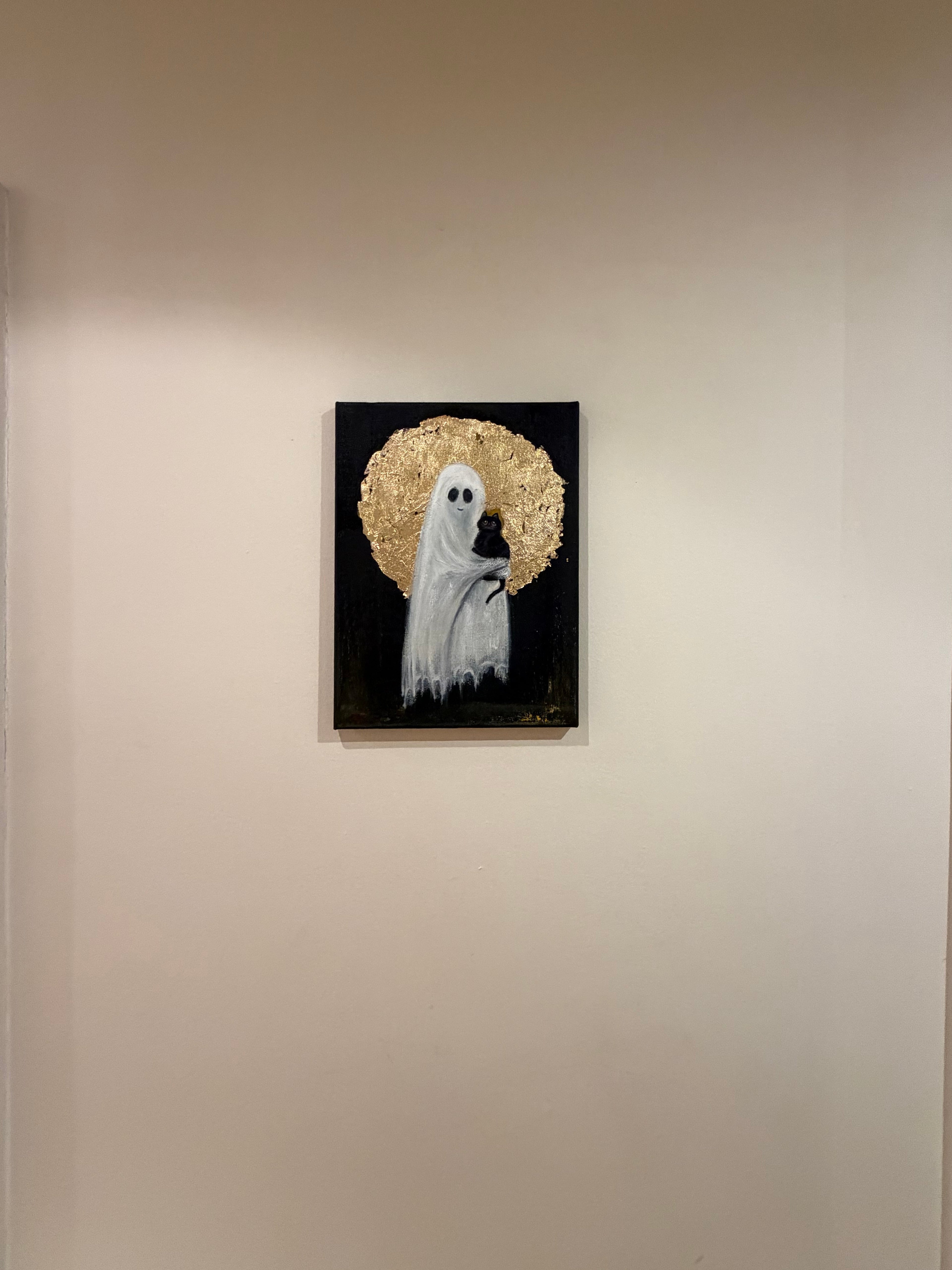 Cat in the Arms of a Sacred Ghost